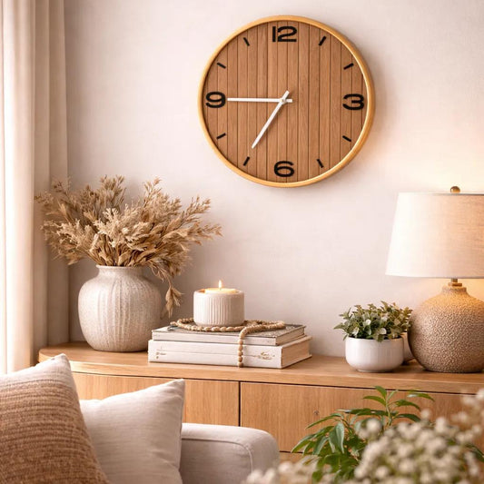 Close-up of gold rim and woodgrain MDF clock face with bold numerals and contrasting hands