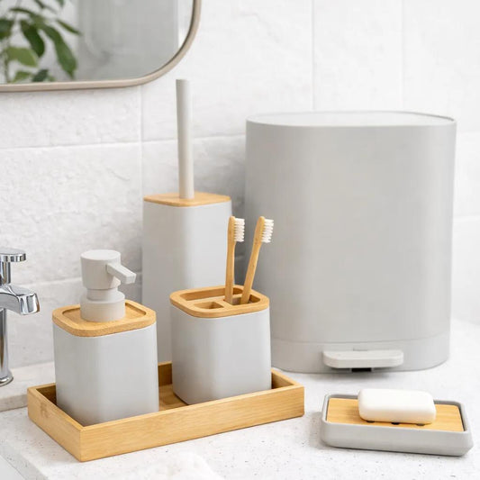 Modern spa-style bathroom accessory set in matte Sand with natural bamboo accents