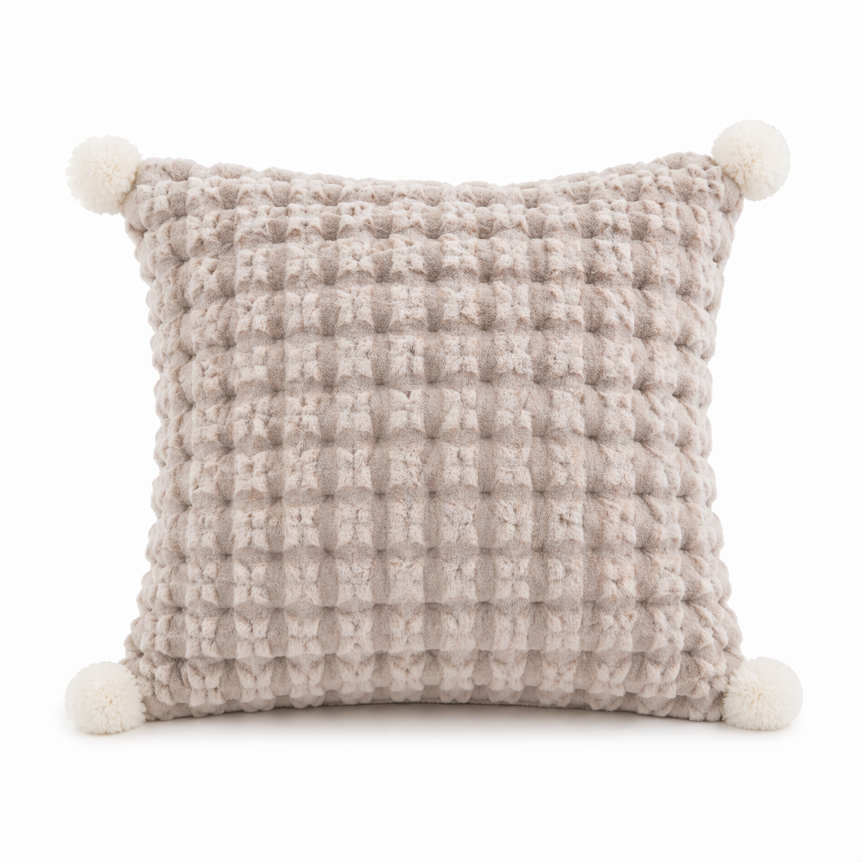 A Chic Pillow That Unfolds Into a Throw-Textured Grid + Pom-Poms for Instant Style