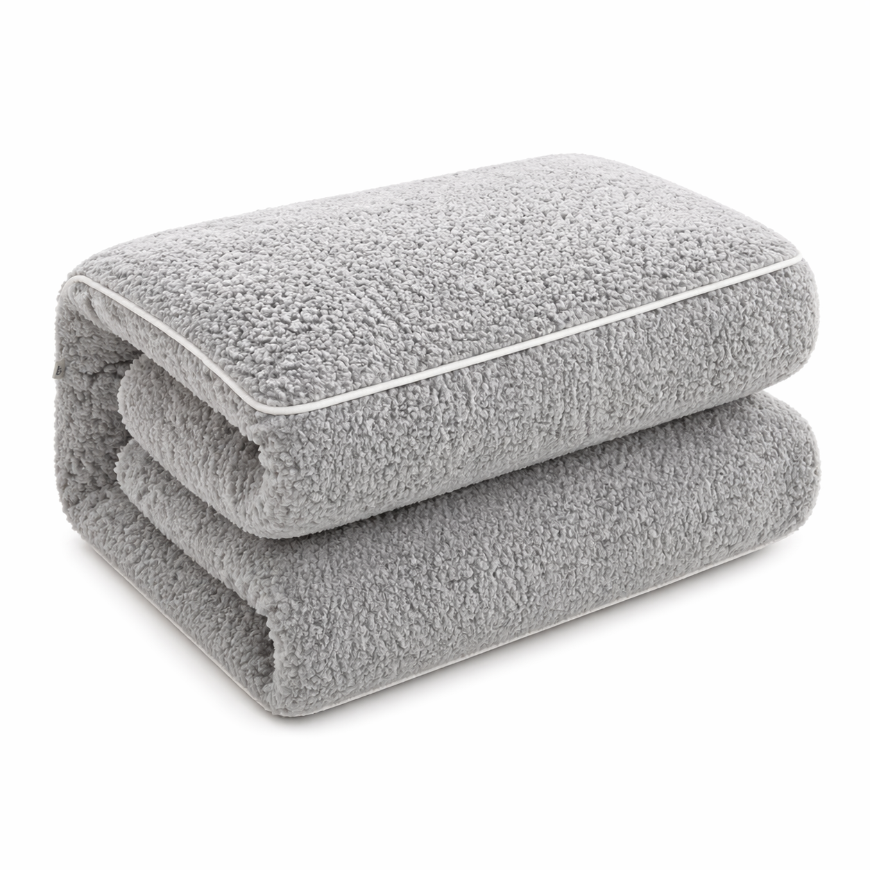 A Minimalist Pillow That Unfolds Into a Throw-Soft Texture, Clean Lines