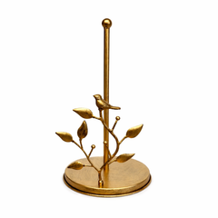 Antique brass decorative paper towel holder with sculptural vine accent on kitchen counter